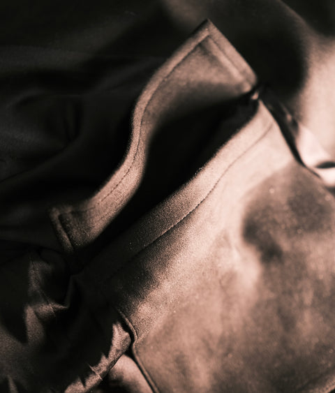 Close-up of a textured fabric surface with a focus on texture and pattern.