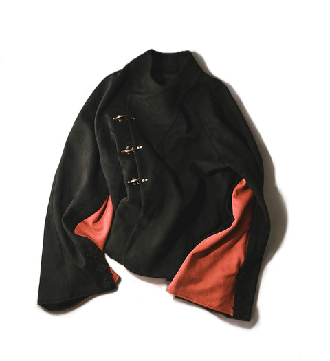 Black jacket with red detachable sleeve on a white background