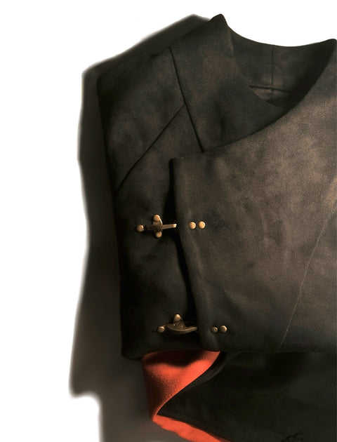 Black leather jacket with copper buttons on a white background