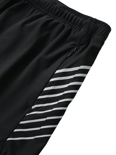 Black shorts with white stripes on a white background